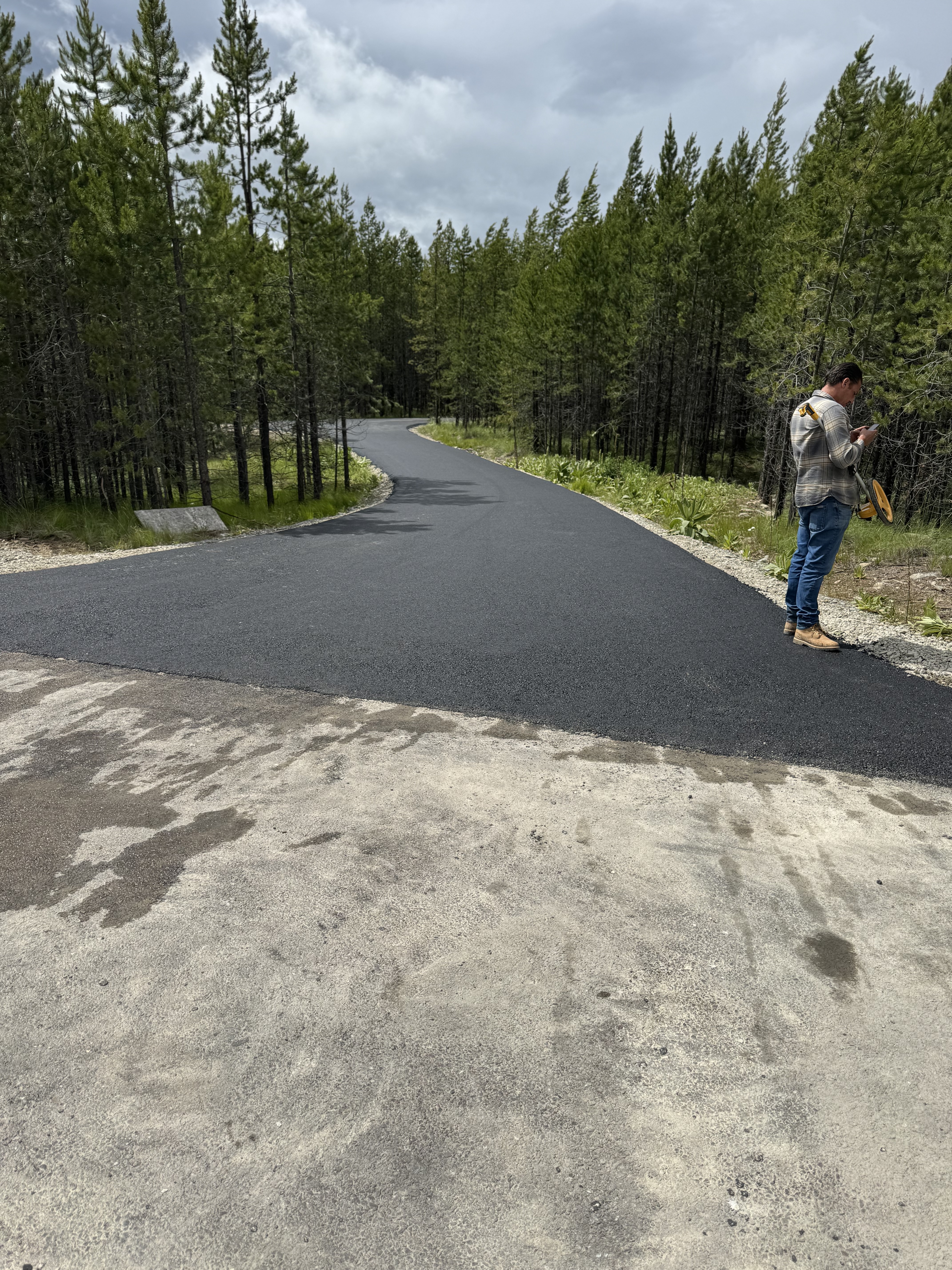 D&M Paving crew paving a mountain road in Colorado